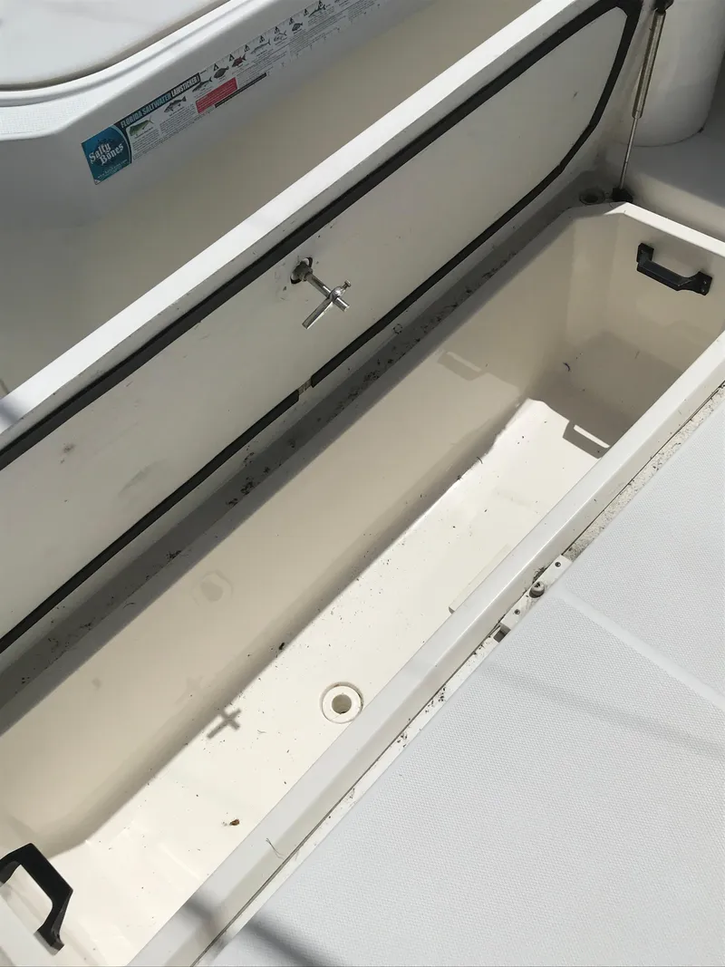 Slide: The Image of Open storage compartment on 2005 Rampage 30' Express Sportfish boat. - 9