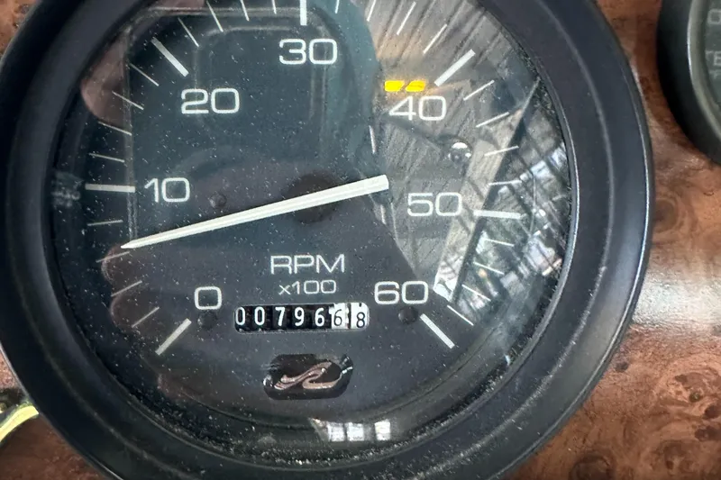 Slide: The Image of Close-up of 1994 Sea Ray 370 Express Cruiser RPM gauge showing 796.8 hours. - 22