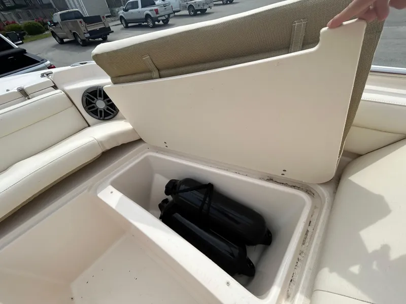 Slide: The Image of 2022 Grady-White Freedom 215 boat storage compartment with fenders inside. - 21