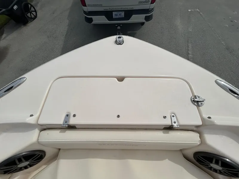 Slide: The Image of 2022 Grady-White Freedom 215 boat bow with storage compartment and speakers. - 22