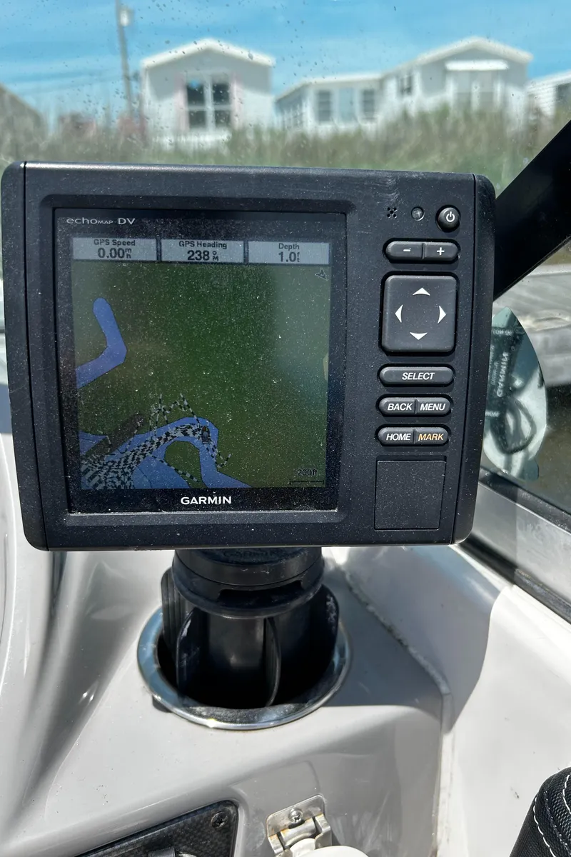 Slide: The Image of Garmin GPS on 2017 Chaparral 21 H2O Sport OB boat dashboard, displaying navigation map. - 15