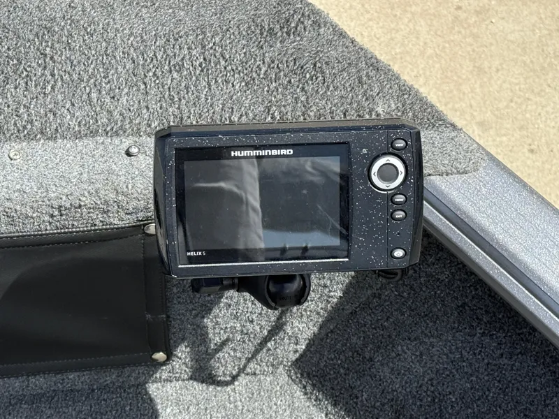 Slide: The Image of Fishfinder on 2018 Lund 1675 Impact Sport boat, featuring Humminbird Helix 5 model. - 10