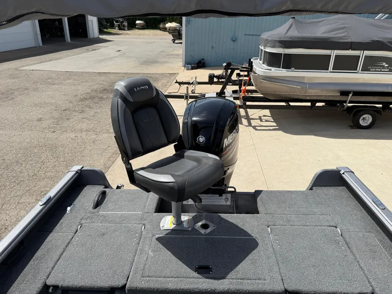 Slide: The Image of 2018 Lund 1675 Impact Sport boat with Mercury engine and swivel seat. - 27
