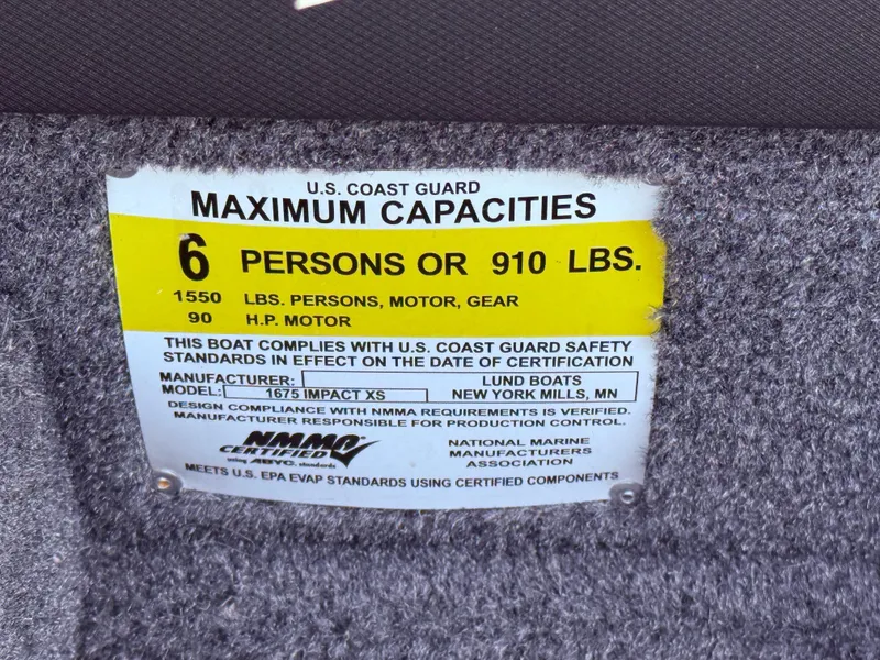 Slide: The Image of 2018 Lund 1675 Impact Sport capacity label: 6 persons or 910 lbs, 90 HP motor. - 29