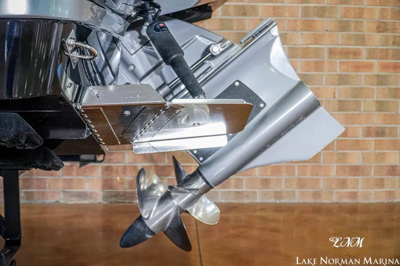 Slide: The Image of 2016 Chaparral 227 SSX SURF boat propeller and outdrive detail at Lake Norman Marina. - 10