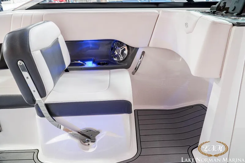 Slide: The Image of 2016 Chaparral 227 SSX SURF boat interior with seating and speaker detail. - 22