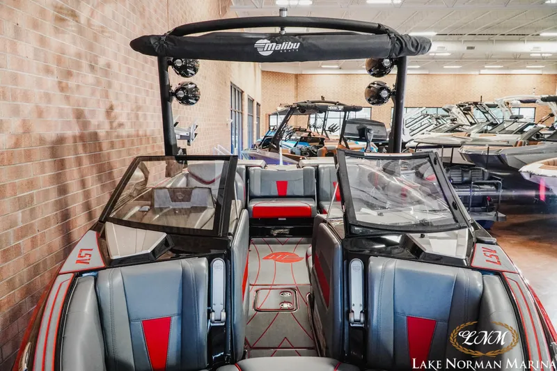 Slide: The Image of 2021 Malibu 23 LSV boat interior at Lake Norman Marina showroom. - 6