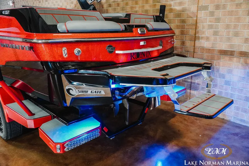 Slide: The Image of 2021 Malibu 23 LSV boat with Surf Gate, displayed at Lake Norman Marina. - 9