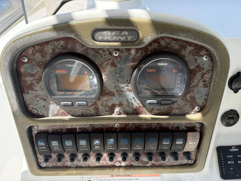 Slide: The Image of Dashboard of 2014 Sea Hunt Ultra 211 boat with Yamaha speed and tachometer gauges. - 33