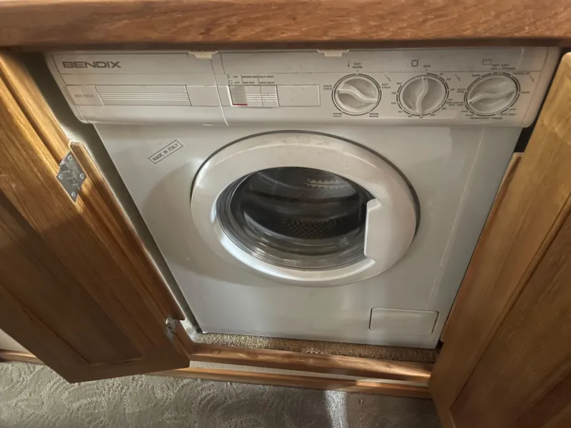 Slide: The Image of Built-in Bendix washing machine on 1999 Bayliner 4788 Motoryacht. - 24