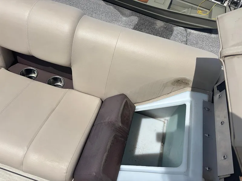 Slide: The Image of 2023 SunCatcher Fusion 22RC boat seat with storage compartment and cup holders. - 15