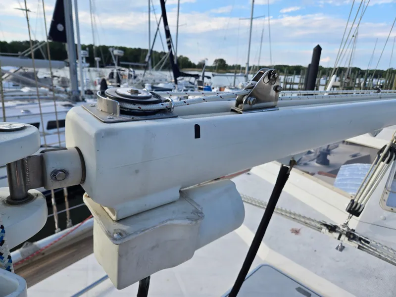 Slide: The Image of Close-up of 1985 Amel Maramu sailboat mast and rigging in a marina. - 12