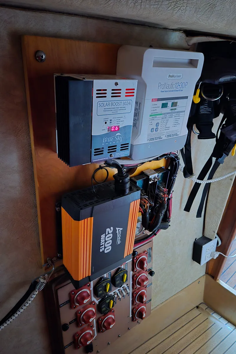 Slide: The Image of Electrical panel on a 1985 Amel Maramu sailboat with inverter and charge controller. - 19
