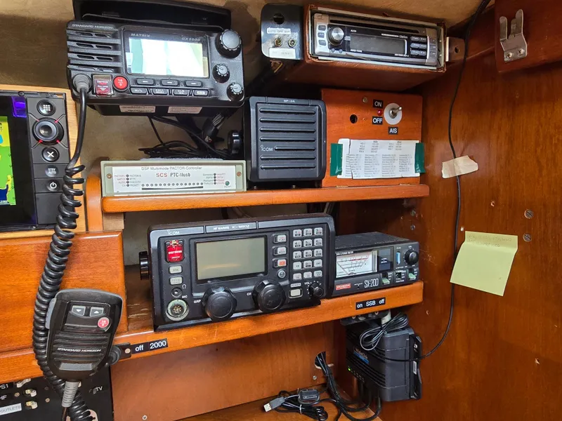 Slide: The Image of Radio and navigation equipment on 1985 Amel Maramu sailboat control panel. - 24