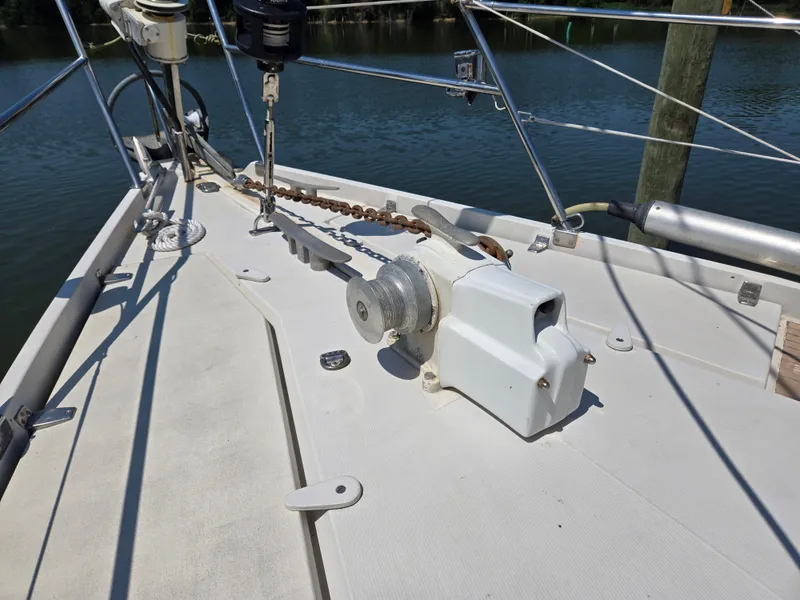 Slide: The Image of Deck of 1985 Amel Maramu sailboat with anchor windlass and chain. - 45