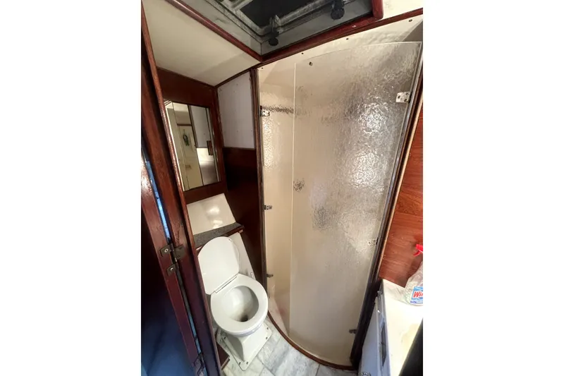 Slide: The Image of Bathroom interior of 1989 Ocean Yachts 55 Super Sport with shower and toilet. - 37