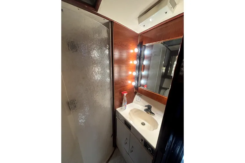 Slide: The Image of Bathroom interior of 1989 Ocean Yachts 55 Super Sport with shower and vanity. - 34