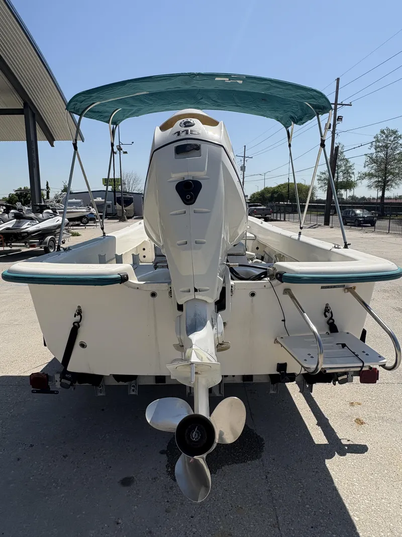 Slide: The Image of Steering console of a 2007 Sundance B20 boat with gauges and controls. - 8