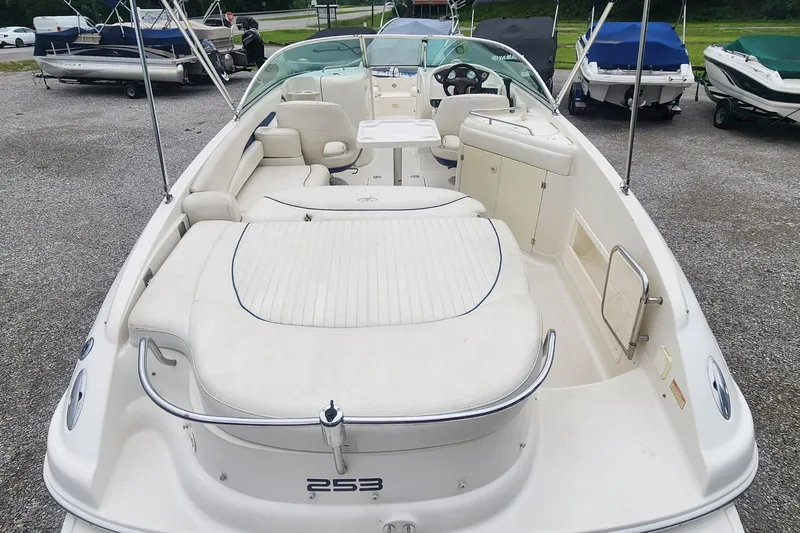 Slide: The Image of 2003 Monterey 253 Explorer Sport boat with spacious seating and sleek design. - 4