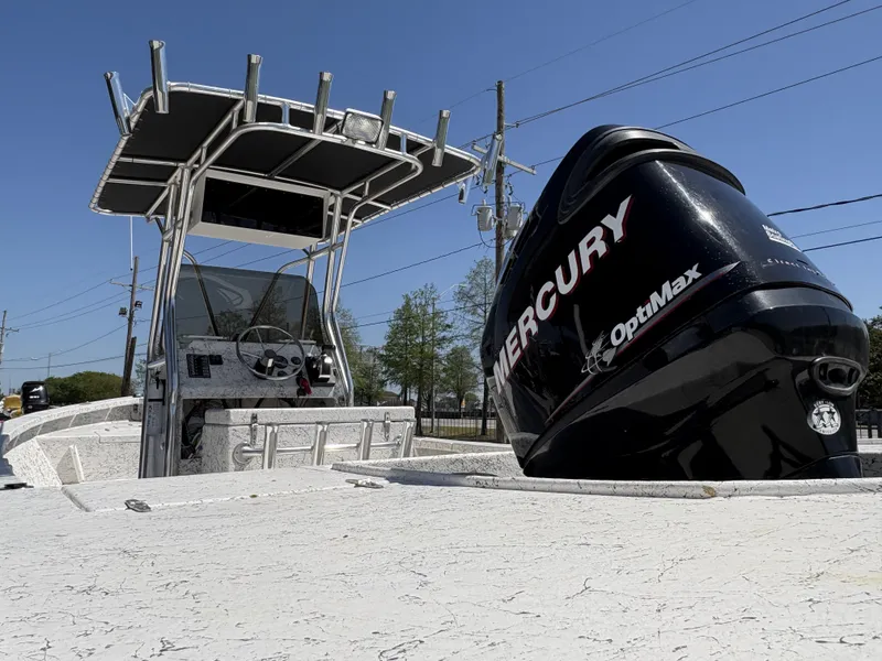 Slide: The Image of Open deck of a 2000 Skiff Reno 23 boat, featuring a clean, textured surface. - 6