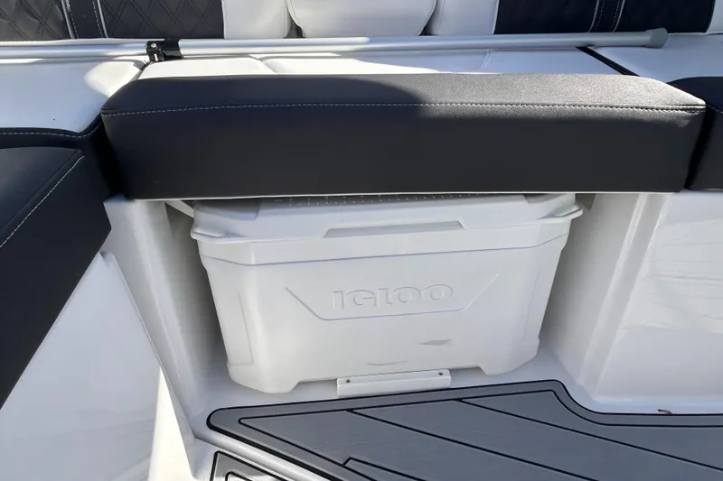Slide: The Image of 2025 Monterey M65 boat interior with Igloo cooler under cushioned seat. - 12