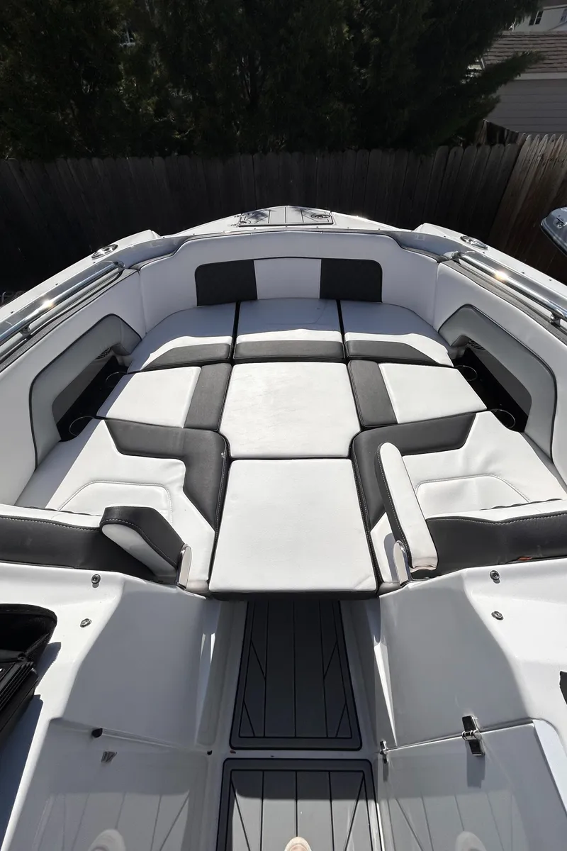 Slide: The Image of 2025 Monterey M65 boat interior with sleek, modern seating and spacious layout. - 3