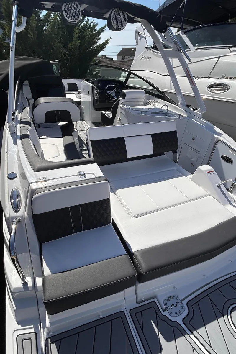 Slide: The Image of 2025 Monterey M65 boat interior with sleek seating and modern design. - 8