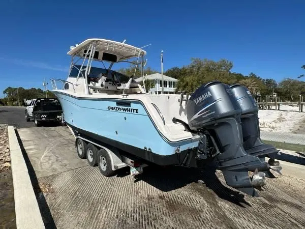 Slide: The Image of 2005 Grady-White Marlin 300 boat with Yamaha engines on a trailer. - 3