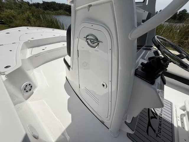 Slide: The Image of 2024 Tidewater 2410 Bay Max boat interior, featuring sleek design and modern controls. - 34