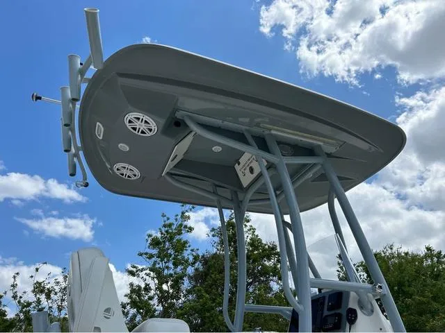 Slide: The Image of 2021 Pathfinder 2600 HPS boat with T-top against a blue sky and clouds. - 3