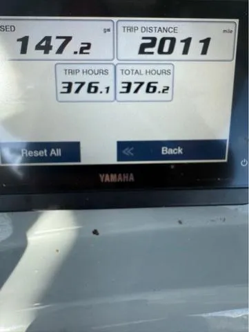 Slide: The Image of Yamaha display showing trip distance, fuel used, and hours for 2021 Pathfinder 2600 HPS. - 6