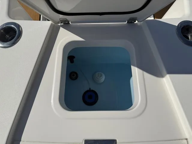 Slide: The Image of Open storage compartment on 2023 Pathfinder 2700 Open boat. - 29