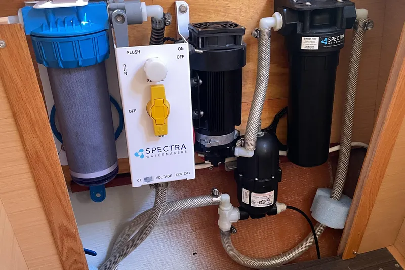 Slide: The Image of Water filtration system in a 2016 Lagoon 380 catamaran, featuring Spectra components. - 29