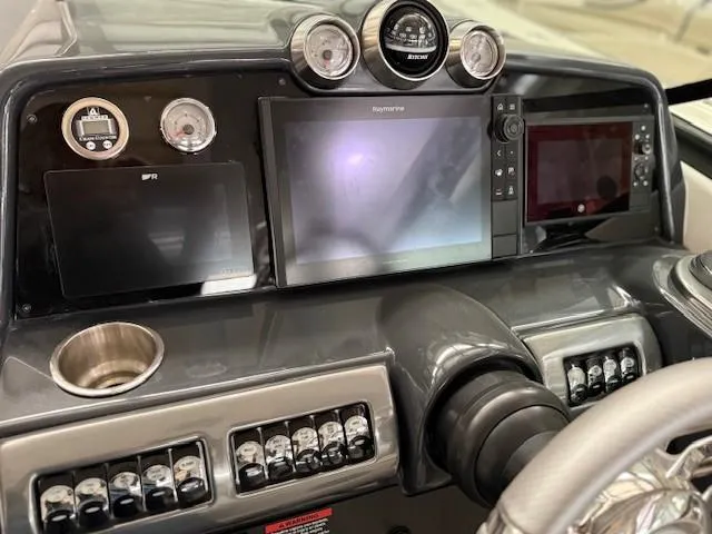 Slide: The Image of 2020 Formula 350 Sun Sport dashboard with advanced navigation and control systems. - 15