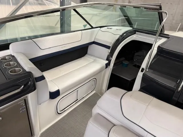 Slide: The Image of 2020 Formula 350 Sun Sport boat interior with white seating and modern design. - 18