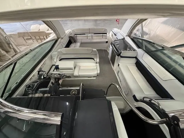 Slide: The Image of 2020 Formula 350 Sun Sport boat interior with luxurious seating and modern helm. - 24