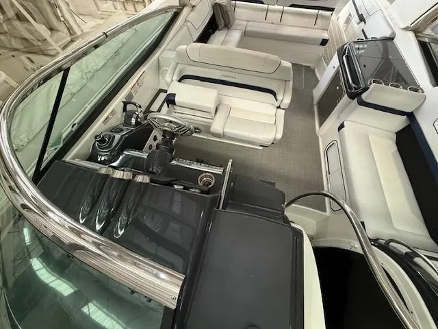 Slide: The Image of 2020 Formula 350 Sun Sport boat interior with luxurious seating and modern helm. - 26