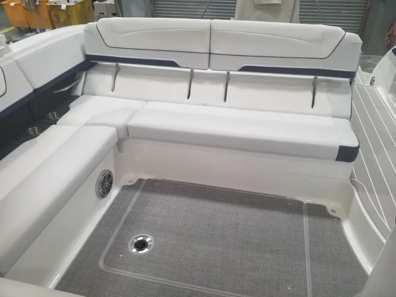 Slide: The Image of 2020 Formula 350 Sun Sport boat interior with white seating and gray flooring. - 37