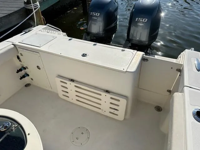 Slide: The Image of 2005 Pursuit 2570 Center Console boat with twin 150 horsepower engines. - 7