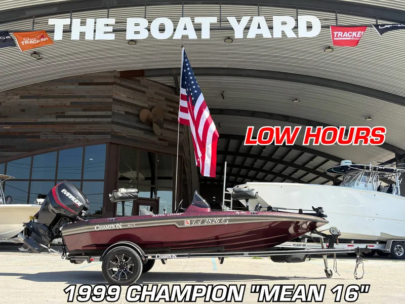 Slide: The Image of 1999 Champion MEAN 16 boat with low hours at The Boat Yard dealership. - 1