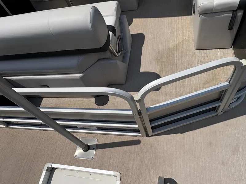 Slide: The Image of 2020 G3 SunCatcher boat interior with seating and railing, showcasing modern design. - 15
