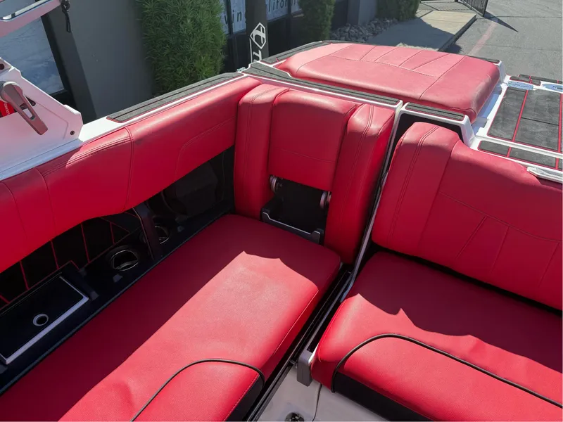 Slide: The Image of Red interior seating of 2023 Malibu Wakesetter 23 MXZ boat. - 14