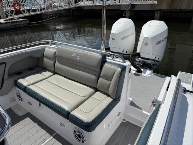 Slide: The Image of 2021 Airship 340 RIB boat with comfortable seating and dual Mercury outboard engines. - 17