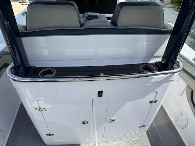 Slide: The Image of 2021 Airship 340 RIB boat interior with seating and storage compartments. - 18