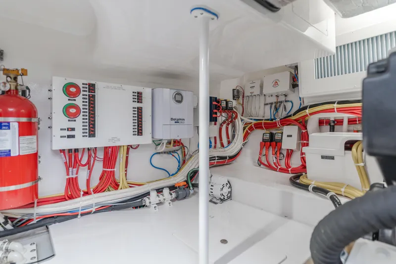 Slide: The Image of Electrical system of 2022 Viking 38 Open Billfish with wiring and control panels. - 23