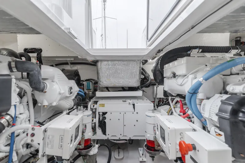 Slide: The Image of Engine room of 2022 Viking 38 Open Billfish, showcasing advanced marine machinery. - 27