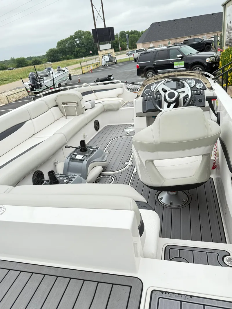 Slide: The Image of 2021 Starcraft MDX191 boat interior with modern seating and controls. - 26