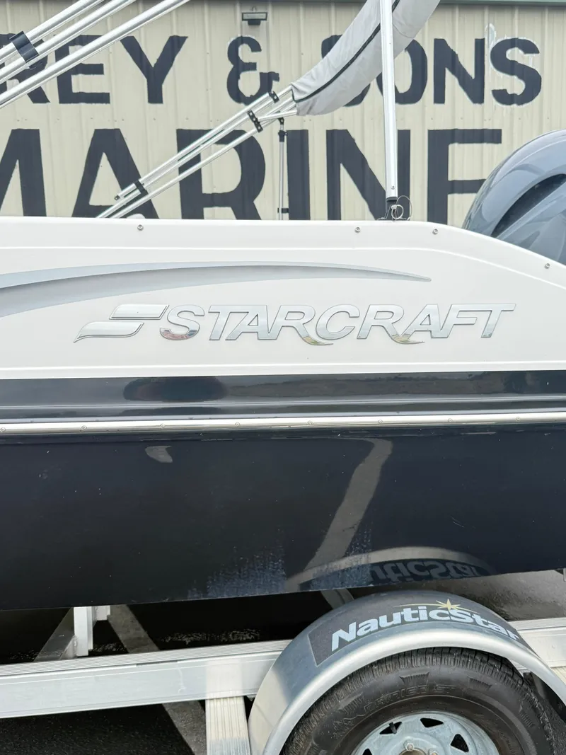 Slide: The Image of 2021 Starcraft MDX191 boat side view with NauticStar trailer. - 4