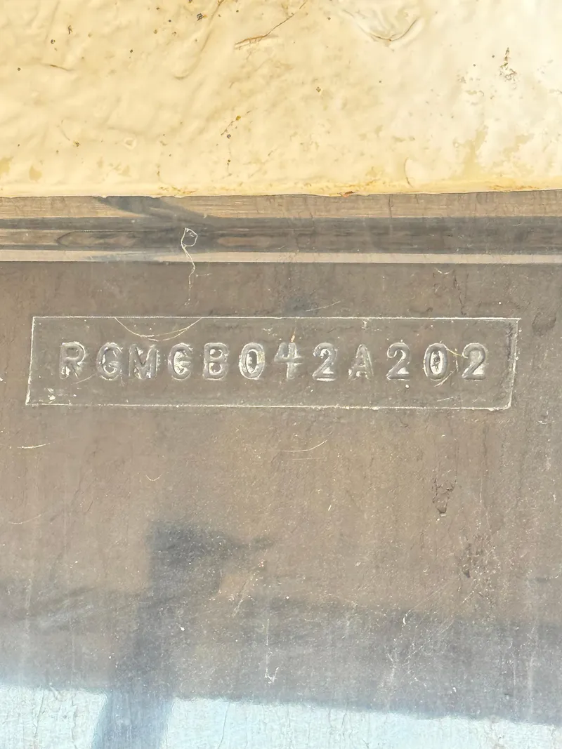 Slide: The Image of Hull identification number on a 2002 Regal 2120 Destiny boat. - 11