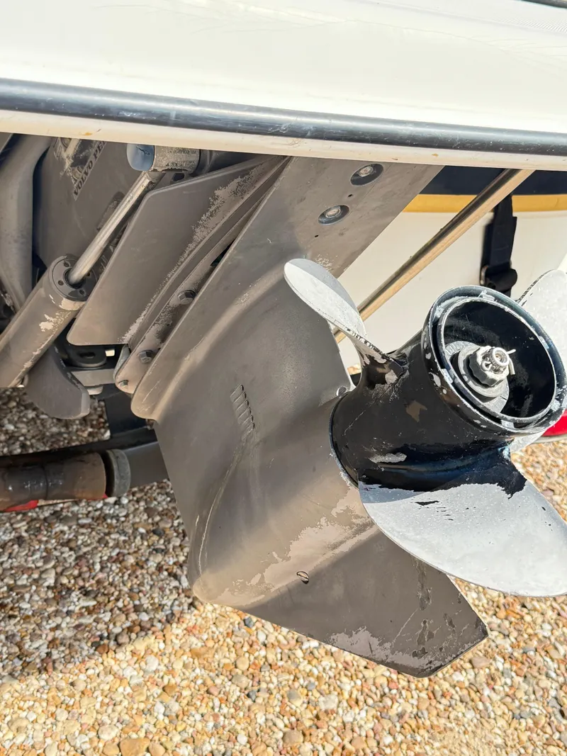 Slide: The Image of Close-up of a 2002 Regal 2120 Destiny boat propeller and lower unit. - 9
